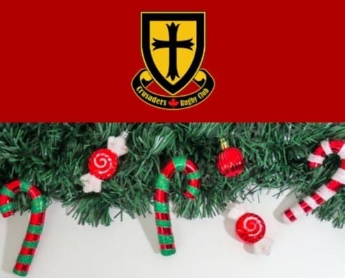 Crusaders Rugby Club crest on a red background above a festive Christmas garland with candy canes.
