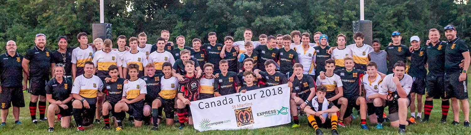 Group photo of Crusaders Rugby Club players in Oakville posing on a rugby field with a banner. Group photo of Crusaders Rugby Club players in Oakville posing on a rugby field with a banner.
