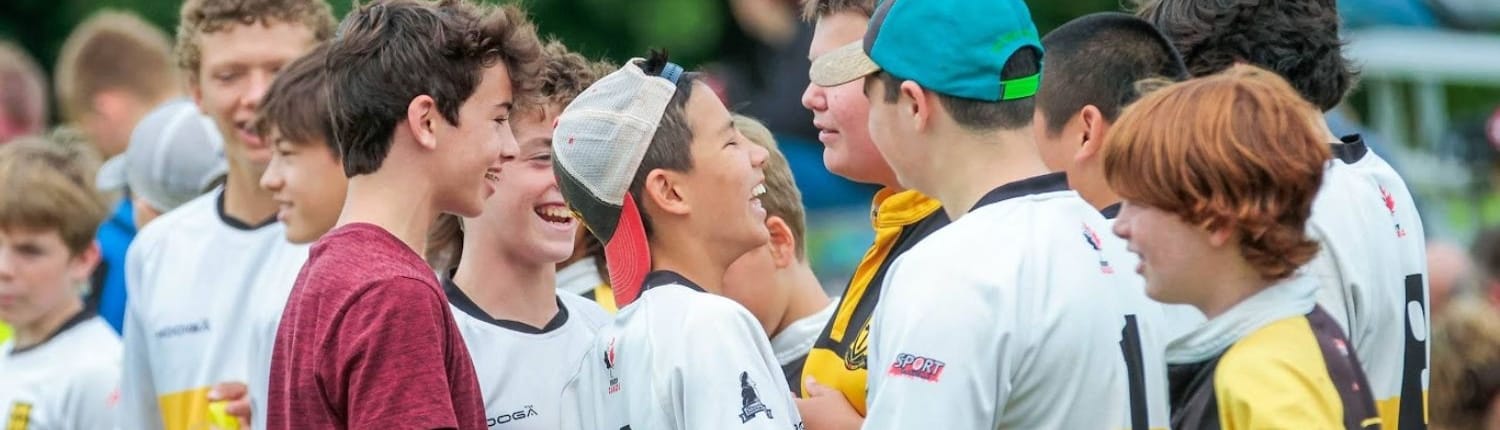 Crusaders Rugby Club players chat and laugh together on a rugby field in Oakville. Crusaders Rugby Club players chat and laugh together on a rugby field in Oakville.