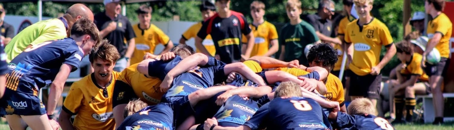 20205-JuniorB Crusaders Rugby Club players in Oakville contest a scrum during a match.