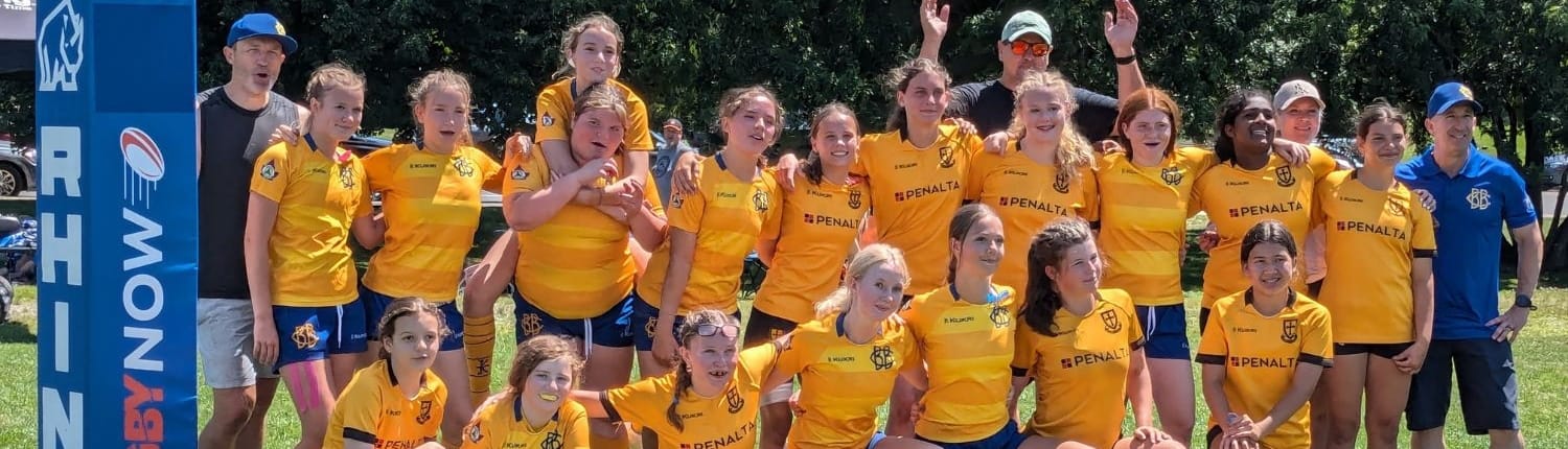 Crusaders Rugby Club players in yellow jerseys pose for a team photo on a rugby field in Oakville. Crusaders Rugby Club players in yellow jerseys pose for a team photo on a rugby field in Oakville.
